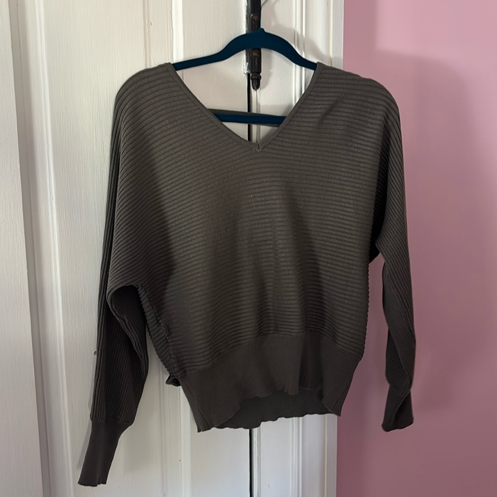 Hippie Rose Dark green sweater with open back
Size M